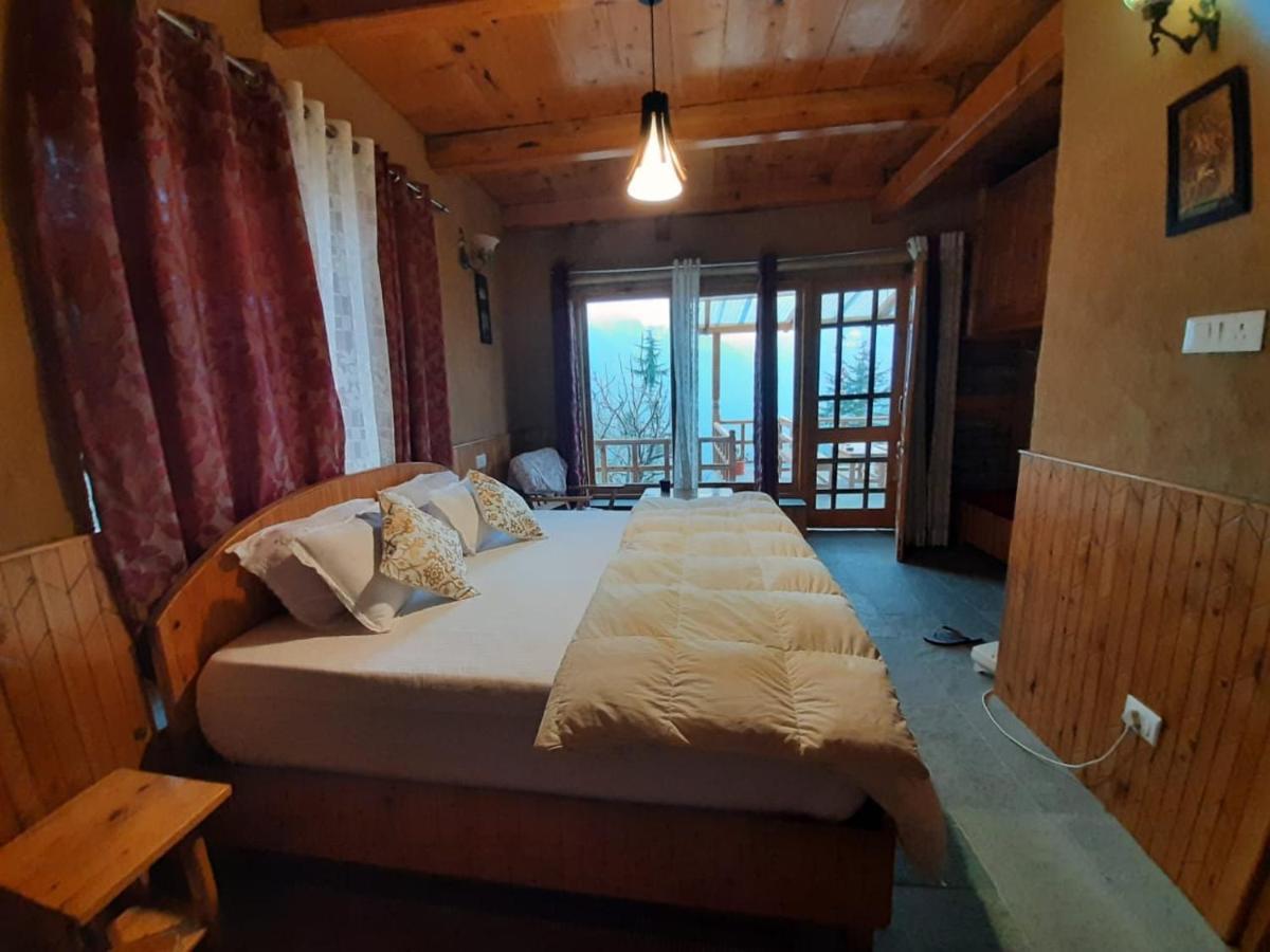 Ishan Log Huts-A Boutique Home Stay Banjār Zewnętrze zdjęcie